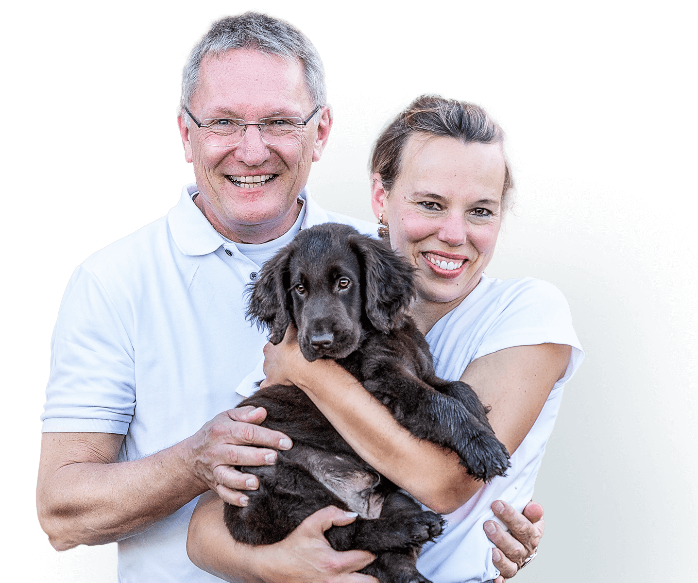 Die Gründer der Site halten einen Hund in ihren Händen